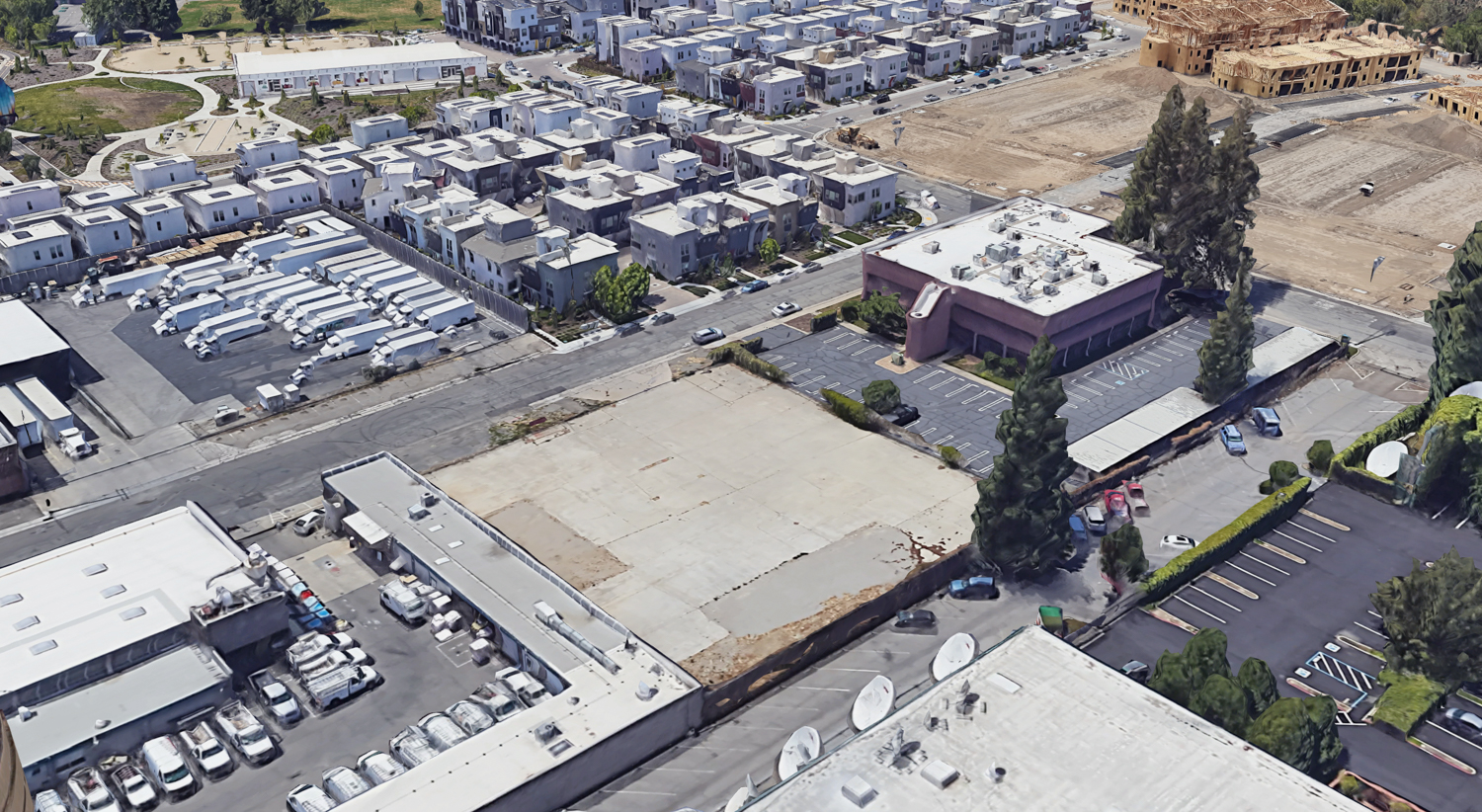 401 1st Avenue project site with Mill at Broadway in the background, image via Google Satellite