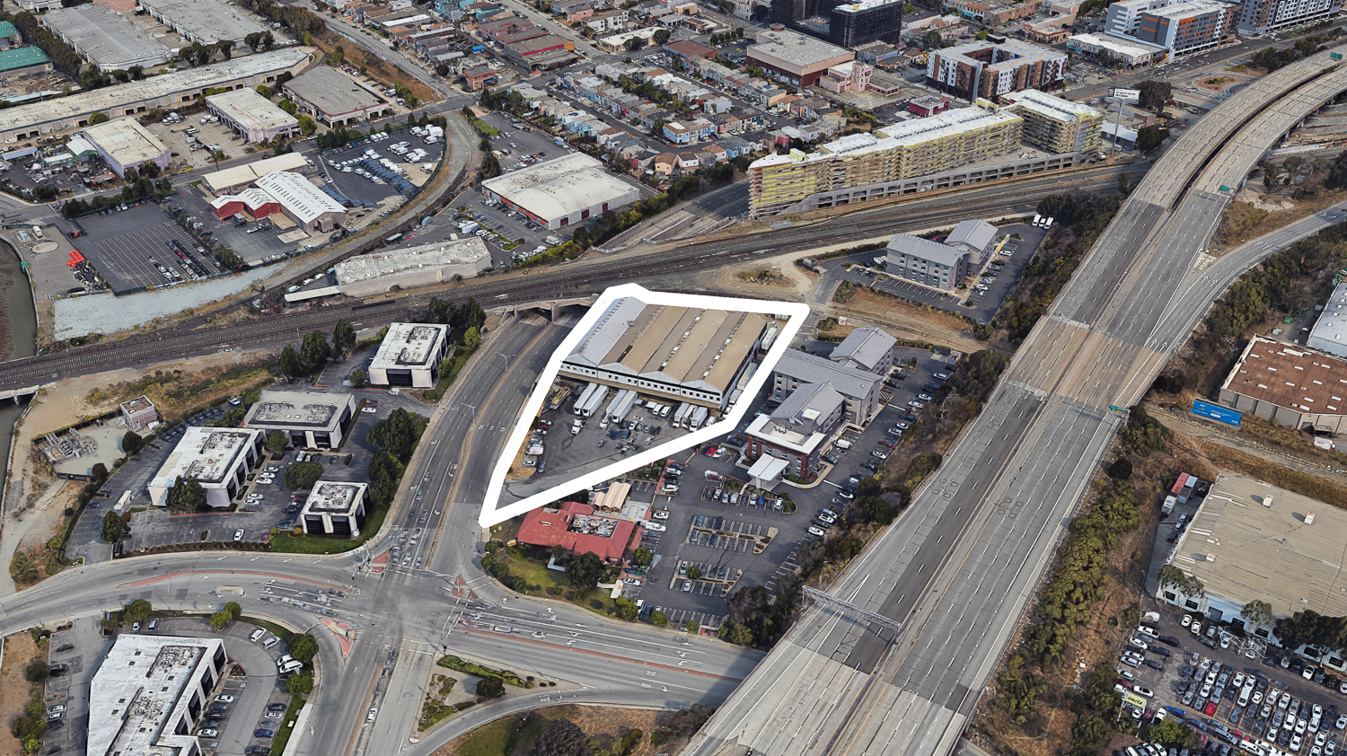 40 Airport Boulevard existing condition, image via Google Satellite