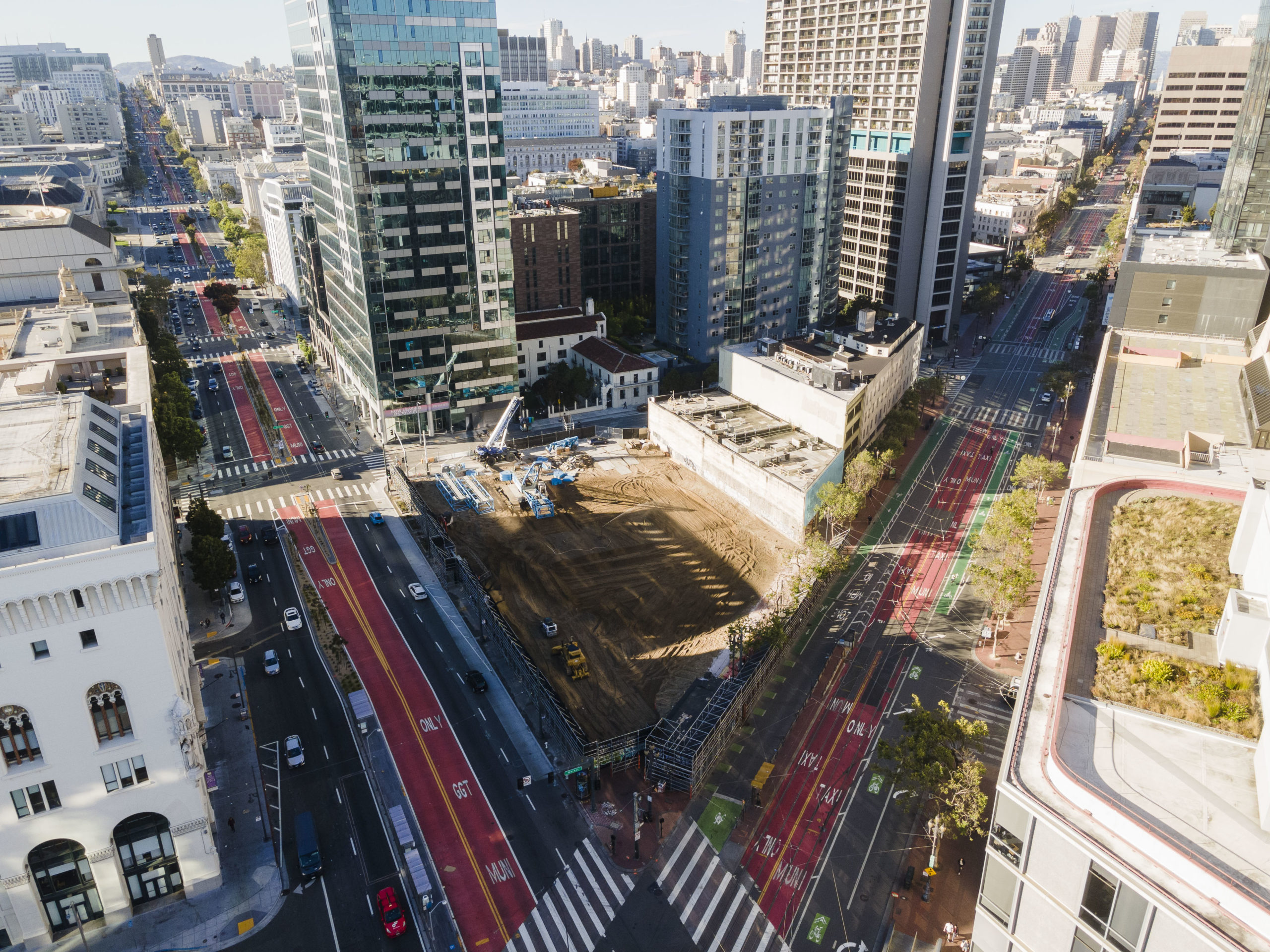 30 Van Ness Avenue aerial view above Market and Van Ness circa July 2022, image by Andrew Campbell Nelson