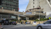 Hilton Hotel Porte-Cochère existing condition seen from across Kearny, image by Andrew Campbell Nelson