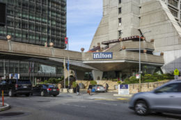 Hilton Hotel Porte-Cochère existing condition seen from across Kearny, image by Andrew Campbell Nelson