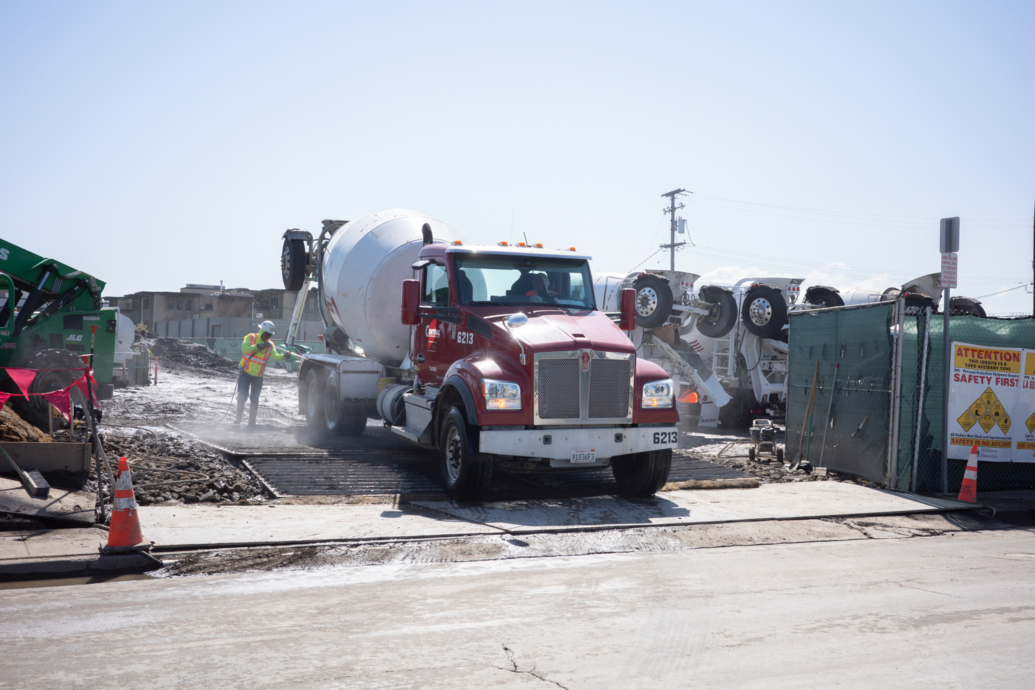 Concrete mixing truck arriving at 1699 Bayshore construction site, image by author