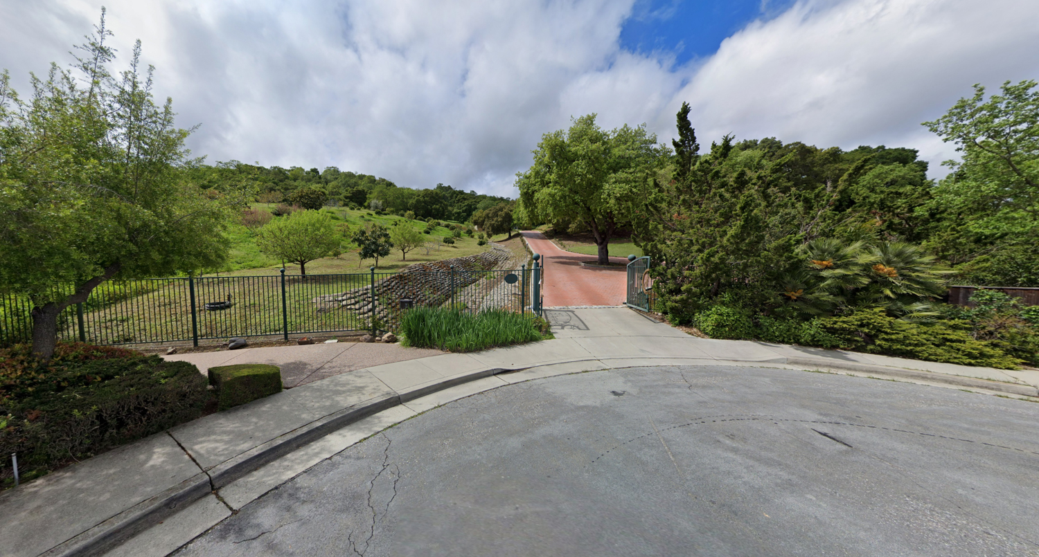 6591 Woodcliff Court, image by Google Street View
