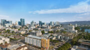 Lake Merritt BART TOD senior housing aerial view, rendering by PYATOK