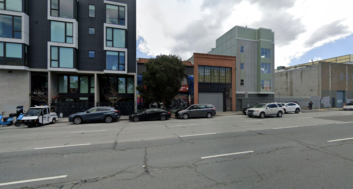 915 Bryant Street obscured by a tree, image via Google