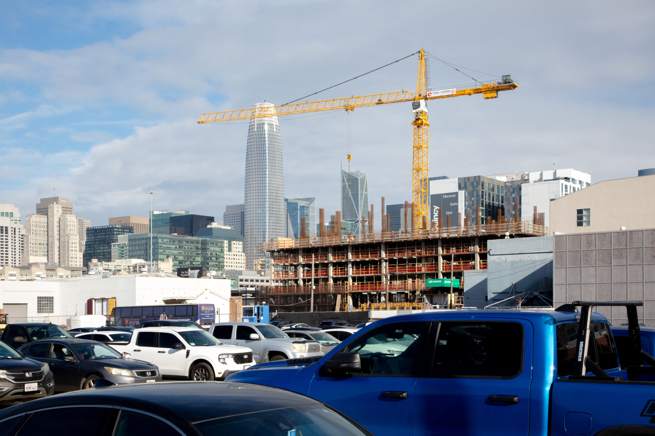 160 Freelon Street construction rising with Salesforce Tower in view, image by Andrew Campbell Nelson