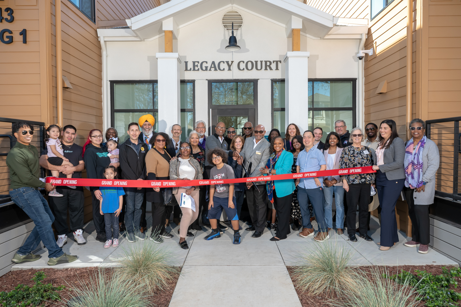 Legacy Court Apartments ribbon cutting event, image courtesy the project team