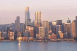 Fifty at First skyline close-up view visible to the right of the Salesforce Tower, rendering by Gensler